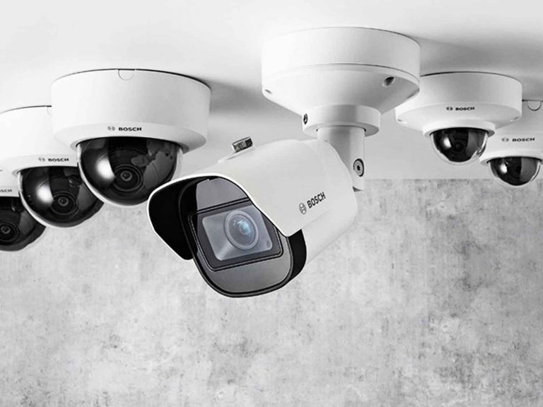 Multiple smart security cameras mounted on a ceiling, showcasing modern surveillance technology for homes and businesses.