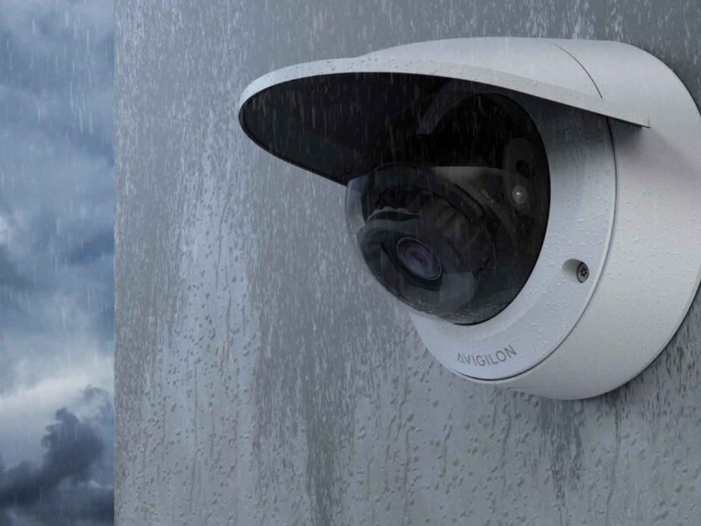 Smart security camera mounted outdoors, illustrating the benefits of modern surveillance technology for home and business protection.